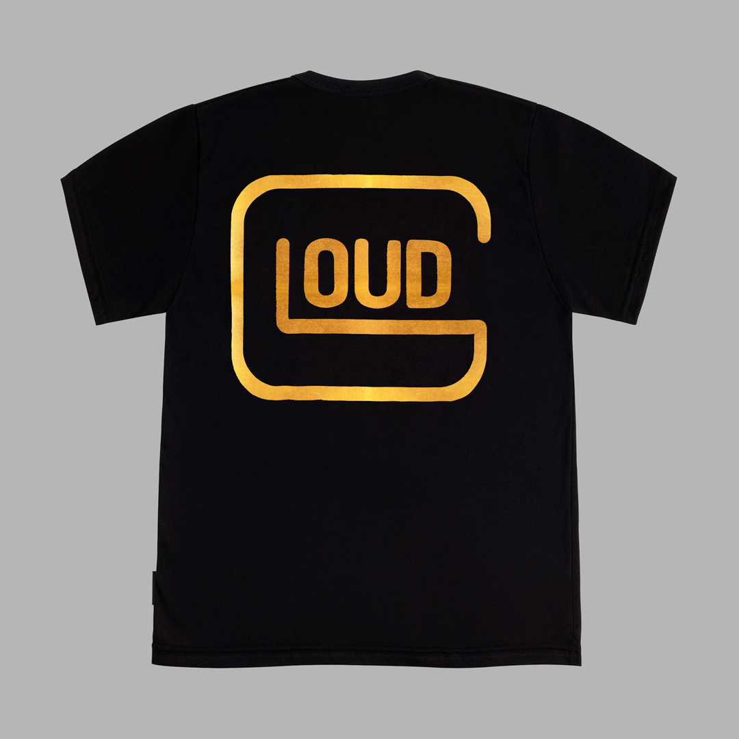 Polera Loud Glock color negro dorado